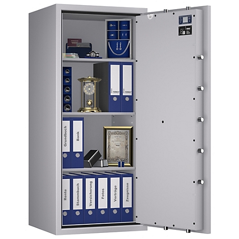 Caja fuerte abierta con carpetas, relojes y joyas. Puerta de metal gris, carpetas azules y blancas.