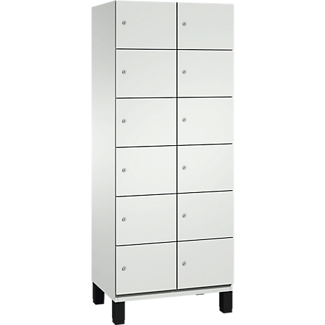 Armoire blanche avec 10 compartiments, des boutons argentés et des pieds noirs. Chaque compartiment a une division claire.