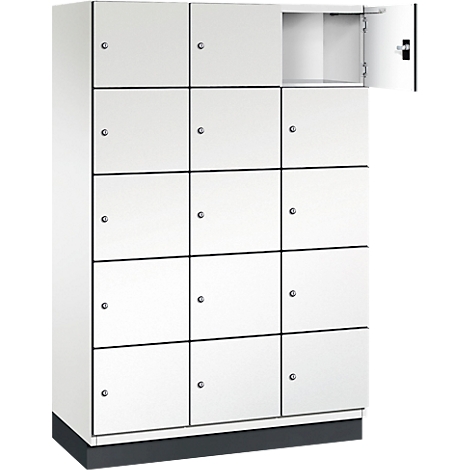 Armoire blanche avec 15 compartiments carrés, dont un ouvert. Bordure noire, base sombre.