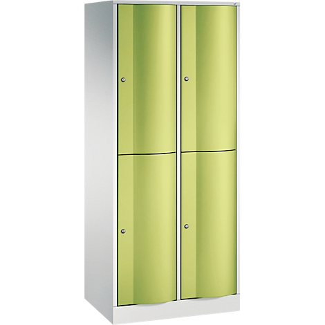 Armoire en métal blanc avec quatre portes, petits boutons et formes légèrement incurvées.