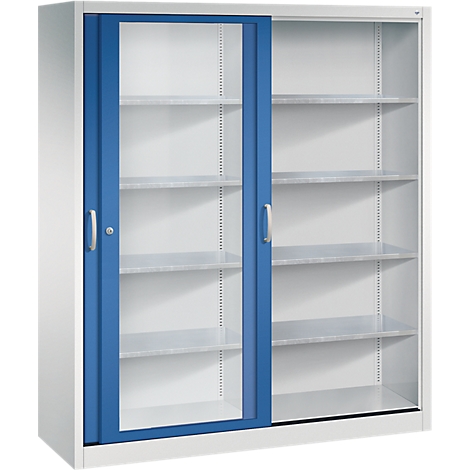 Armoire métallique grise avec portes coulissantes vitrées bleues et plusieurs étagères sur fond blanc.