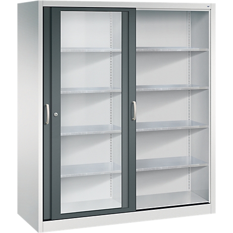 Grande armoire métallique blanche avec deux portes coulissantes grises et étagères visibles sur fond neutre.
