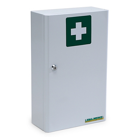 Une armoire à pharmacie en métal blanc verrouillable avec une croix verte sur la porte.