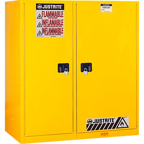 Armoire de sécurité jaune à deux portes, mécanisme de verrouillage et étiquettes d'avertissement : "Inflammable".