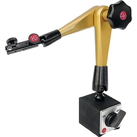 Metal holder with joints and rotating knob, gold-colored. On a black block with ON/OFF switch.