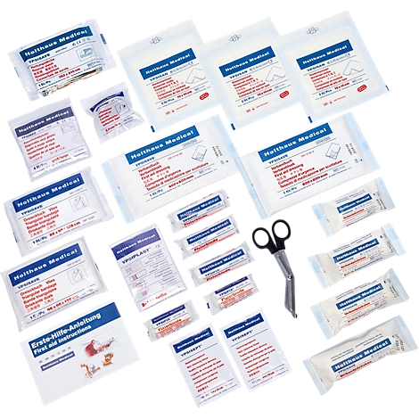 Produits médicaux emballés avec ciseaux et instructions. Impressions avec "Holthaus Medical".