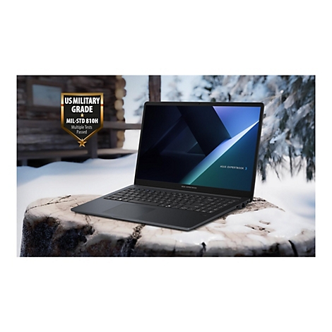 Ein schwarzer Laptop auf einem Baumstamm. Auf dem Bildschirm steht ASUS EXPERTBOOK. Links ein Logo, das die US-Militärnorm MIL-STD 810H ausweist.