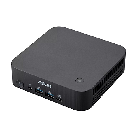 Kompakter schwarzer Asus Mini-PC mit Anschlüssen auf der Vorderseite vor neutralem Hintergrund.