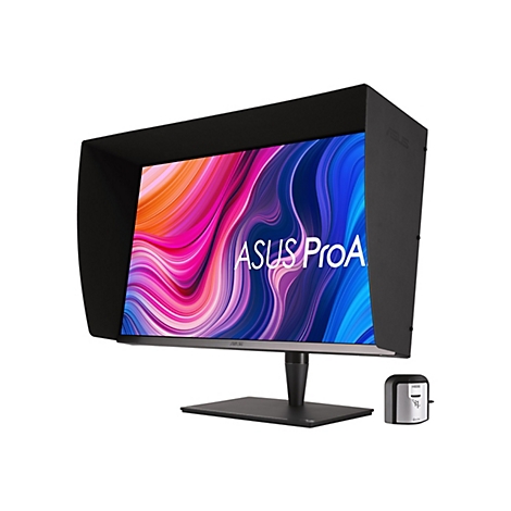Ein schwarzer Monitor mit Sonnenblende. Auf dem Bildschirm: buntes Design mit Schriftzug ASUS ProArt. Rechts daneben ein Farbkalibrierungstool.