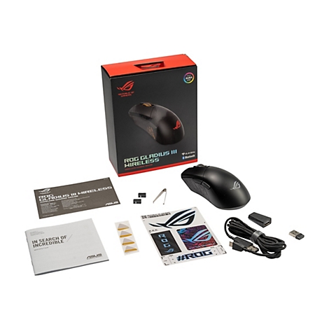 Vue de dessus d'un ensemble de souris de jeu. Il montre une souris de jeu sans fil ROG Gladius III noire, une boîte, des câbles, des autocollants et des accessoires.