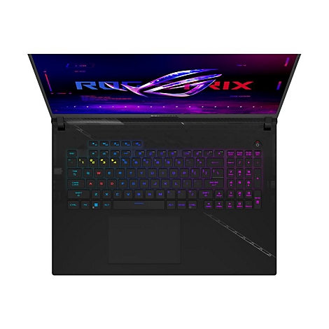 Draufsicht auf einen schwarzen Laptop mit beleuchteter Tastatur. Auf dem Display ein ROG-Logo. Tastenbeleuchtung in Blau, Grün und Pink.