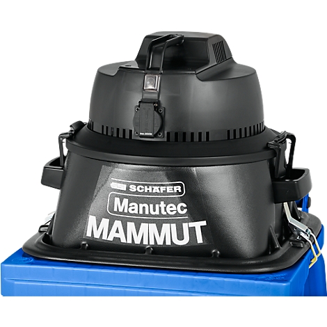 Black industrial vacuum cleaner "Manutec Mammut" by Schäfer on a blue surface. With handle, side holders and lettering on top.
