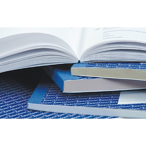 Open book resting on a stack of blue notebooks with white paper. The notebooks have the inscription 'Zweckform'.