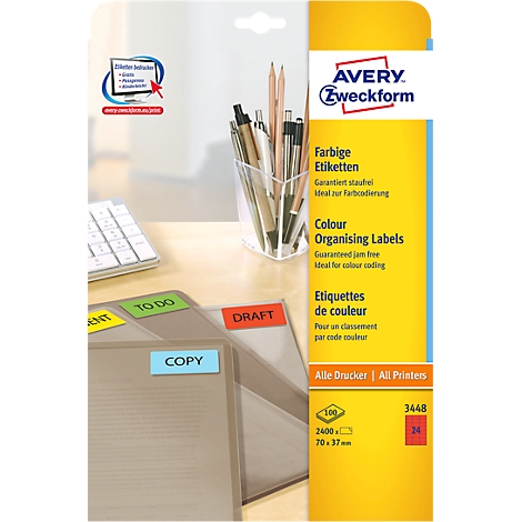 Avery Zweckform label pack, next to documents with colored labels, office background.