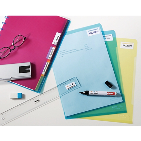 Overhead view of office supplies: folders, pens, ruler, eraser, glasses.