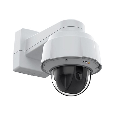 Une caméra de surveillance blanche avec un dôme en verre, fixée sur un support blanc monté sur un mur. Le texte "AXIS COMMUNICATIONS" est visible.