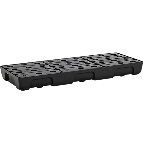 Boîte rectangulaire noire avec plusieurs trous. Surface divisée en blocs individuels.