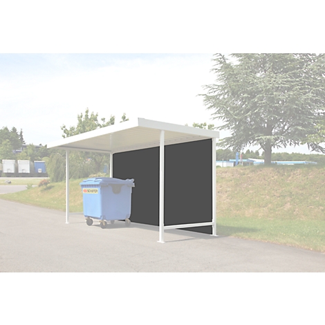 A white shelter with a blue wheeled trash container. Black wall, paved path, tree.