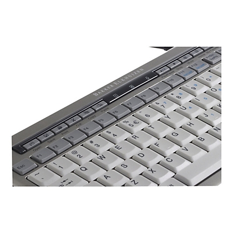 Nahaufnahme einer ergonomischen Tastatur in Silber und Weiß mit Fokus auf die Funktionstastenreihe.