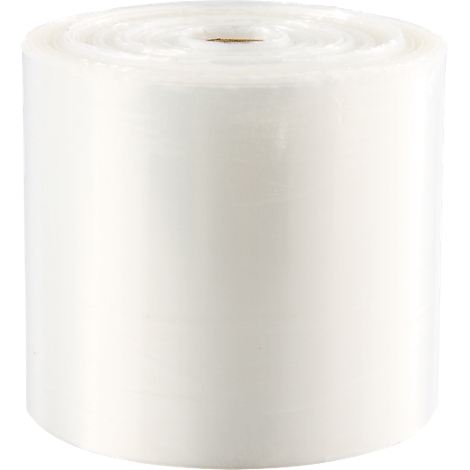 Rouleau de film transparent, blanc, roulé. Faits saillants et ombres.