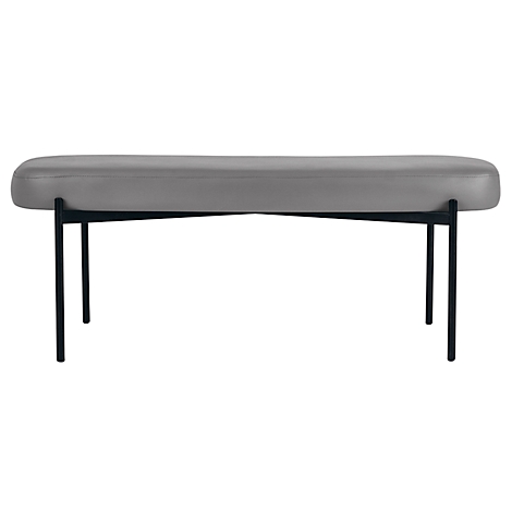 Grijze bank met zwart metalen frame. Gevoerde zitting, vier poten. Eenvoudig ontwerp.