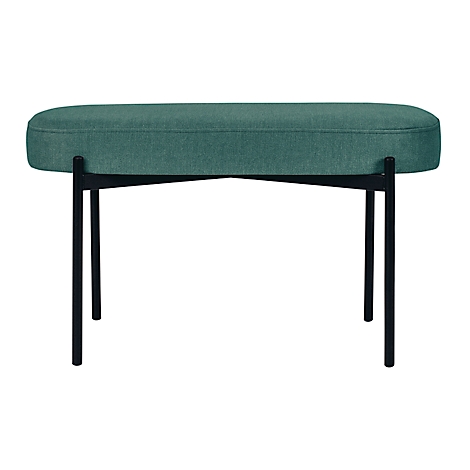 Een ovale poef met groene stoffen bekleding op een zwart metalen frame.