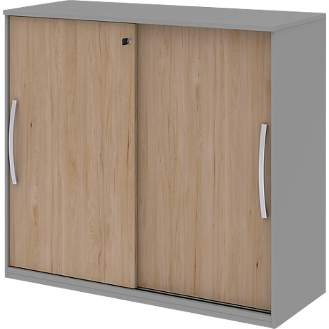 Gray cabinet with wood front with two sliding doors and silver handles.