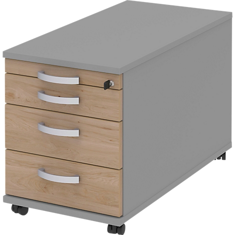 Grey mobile pedestal with three drawers and silver handles. The cabinet stands on castors.