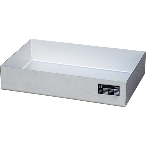 Rectangular silver metal tray. A small label with text is attached to one side.