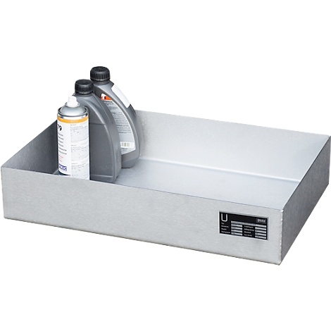 Metal tray with oil bottles and spray can, a label on the corner.