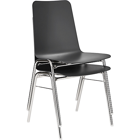 Two black chairs, stacked, with chrome legs.