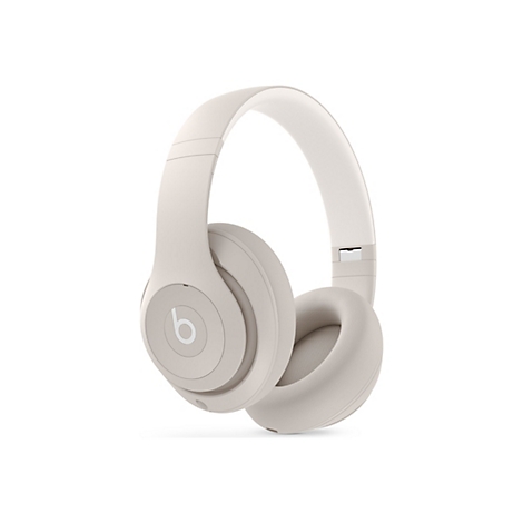 Beige Over-Ear-KopfhÃ¶rer mit b Logo auf den Ohrmuscheln.