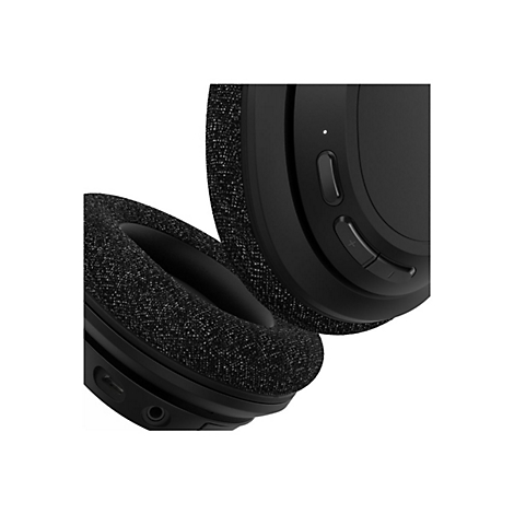 Gros plan sur un casque noir avec rembourrage en tissu. Boutons et ports sont visibles.