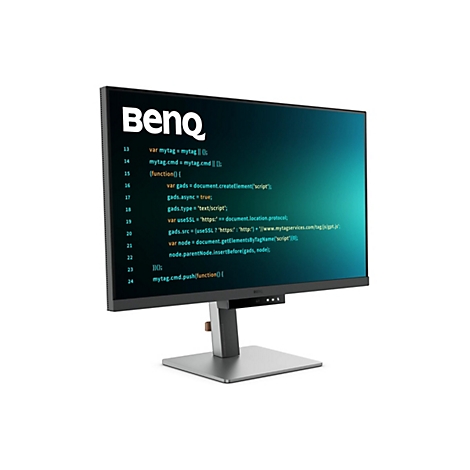 Un moniteur BenQ affiche un écran vert avec du code Javascript. Le moniteur est placé sur un fond blanc.