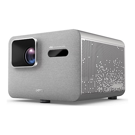 Projecteur gris avec côté perforé, objectif et texte "4K Auto Picture Tuning". Marque : BenQ.