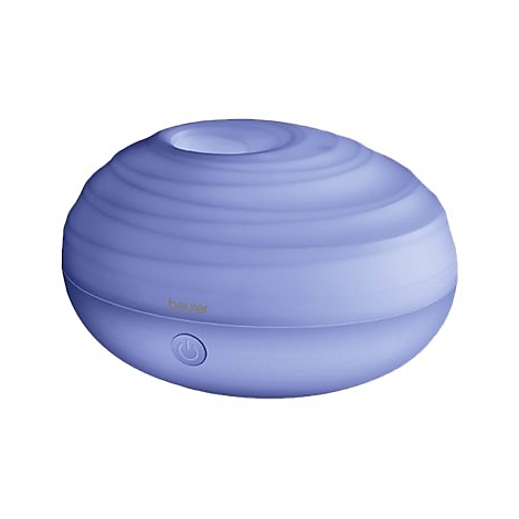 Ein lila, leuchtender Beurer Aromadiffusor in ovaler, steinähnlicher Form mit mittigem An-Aus-Schalter.
