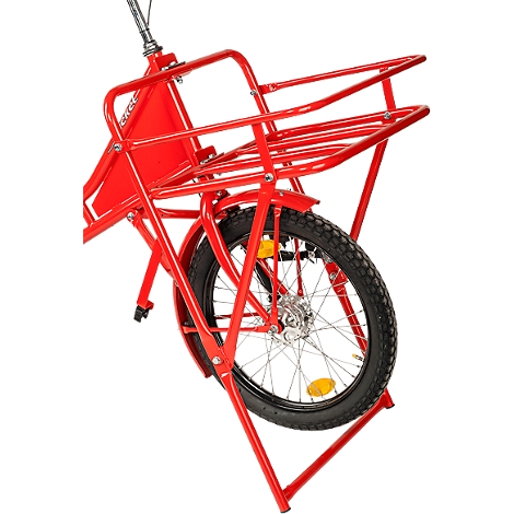 Remolque de bicicleta rojo, vista detallada. El marco, el portaequipajes y la rueda son claramente visibles.