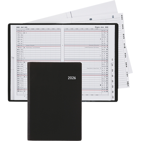 Un carnet noir avec l'estampage 2026, ouvert sur une page de calendrier. A côté, d'autres pages de calendrier.