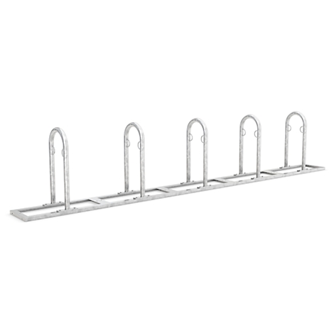 Metal bike rack with curved arches, five spaces.