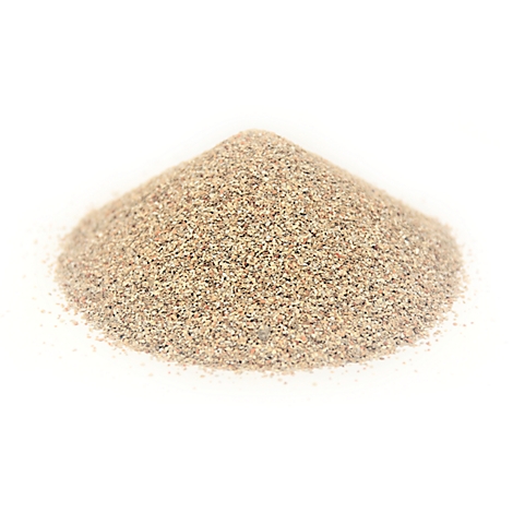 A pile of granular, beige material, possibly sand, against a white background.