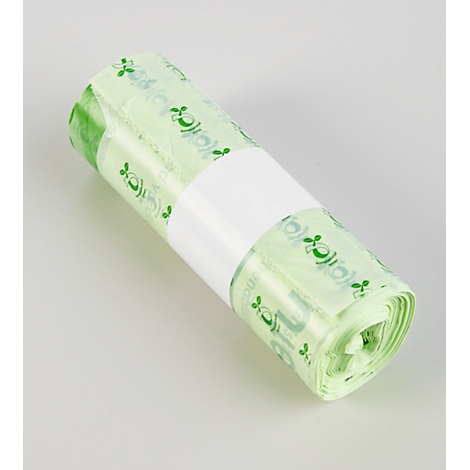 Rolle grüne Müllbeutel mit weißem Papierband. Aufgedrucktes Logo.