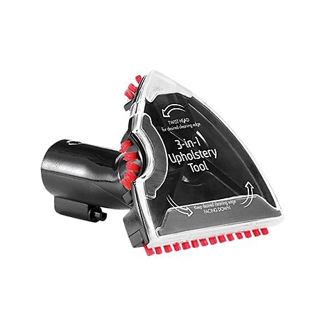 Ein schwarzes Polsterwerkzeug mit roter Bürste und transparentem Aufsatz. Es trägt die Aufschrift "3-in-1 Upholstery Tool".