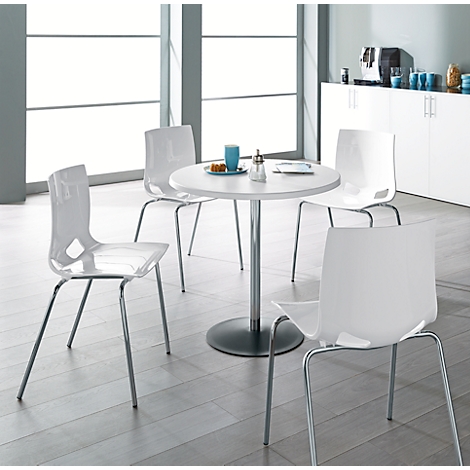 Four white chairs surround a round table. The table has a silver column and a black base. Light wooden parquet.