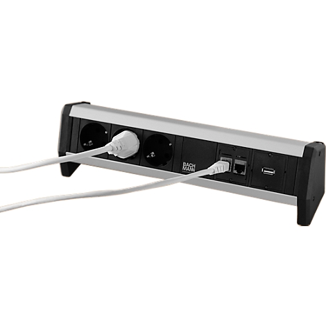 Une multiprise argentée et allongée avec 3 prises, une connexion pour câble réseau et un port USB, une prise est dans une prise.