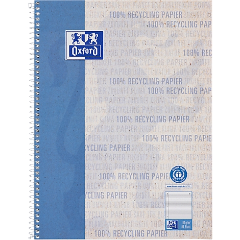 Cahier Oxford bleu à spirales. Le papier est imprimé avec le texte "100% Papier recyclé". Sur le devant se trouvent le logo Oxford et d'autres logos.