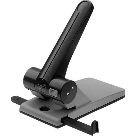 Black and gray hole punch. The lever is up. The inscription "NOVUS" can be seen on the device.