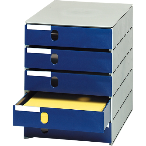 Classeur de bureau bleu et gris avec quatre tiroirs, dont un ouvert, rempli de papier jaune.