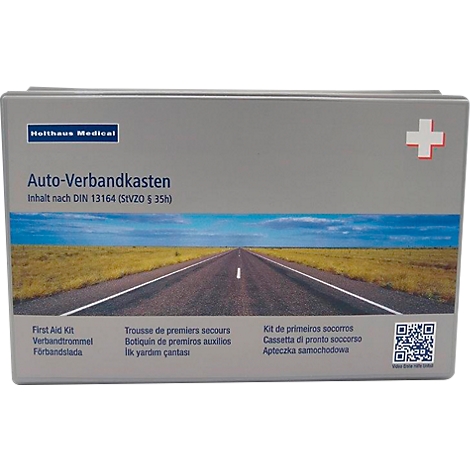 Trousse de premiers secours pour voiture Holthaus Medical grise avec image de paysage et croix blanche.