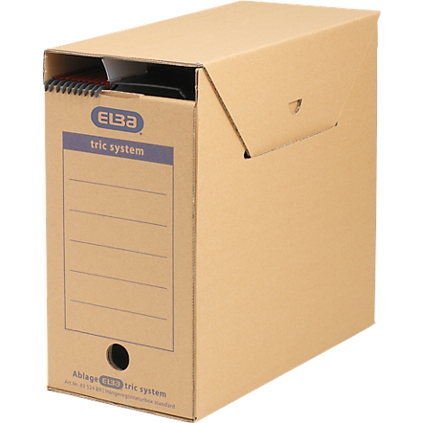 Boîte de classement marron avec le logo ELBA bleu et l'inscription 'tric system'. La boîte comporte des champs d'étiquetage et un trou rond.