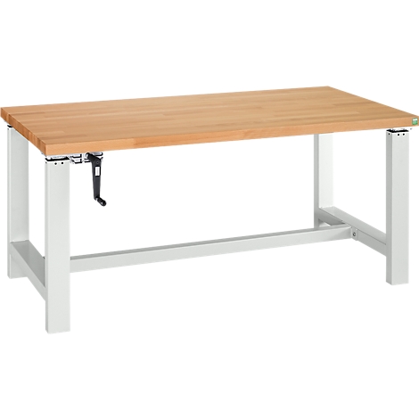 Banco de trabajo marrón claro con tapa de madera, estructura blanca y manivela. Vista detallada.